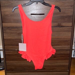 Coral kittenish bathing suit